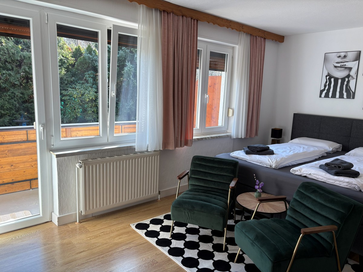 Afbeelding van Luxe 2-persoons kamer met balkon en zicht op tuin