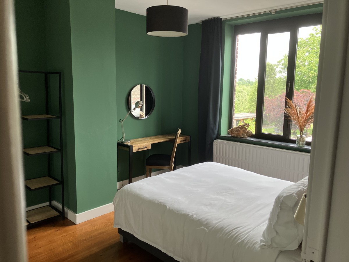 Afbeelding van Stijlvolle familie kamer met ruime badkamer.