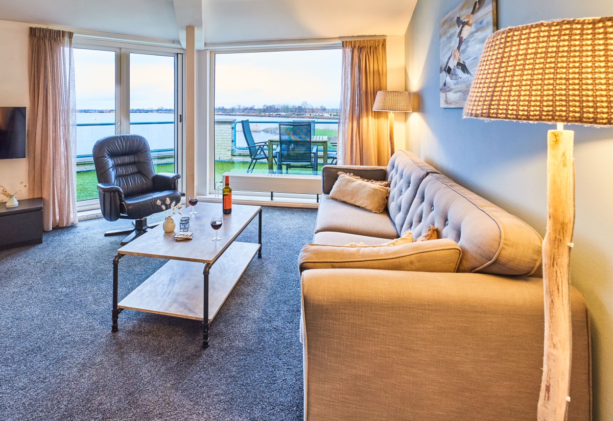 Afbeelding van Uniek appartement met meerzicht en zonsondergang