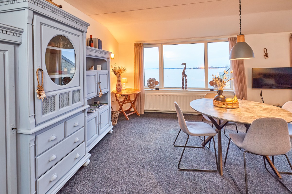 Afbeelding van Uniek appartement met meerzicht en zonsondergang