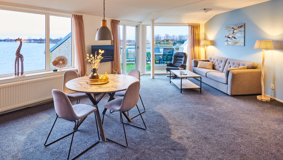 Afbeelding van Uniek appartement met meerzicht en zonsondergang