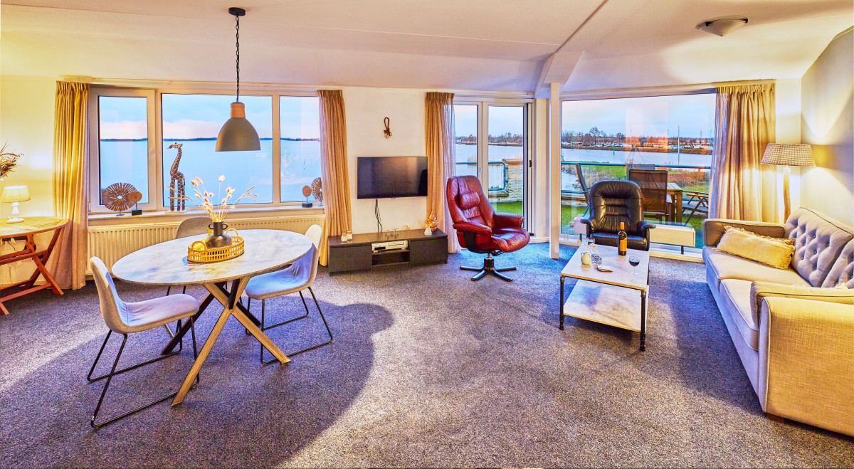 Afbeelding van Uniek appartement met meerzicht en zonsondergang