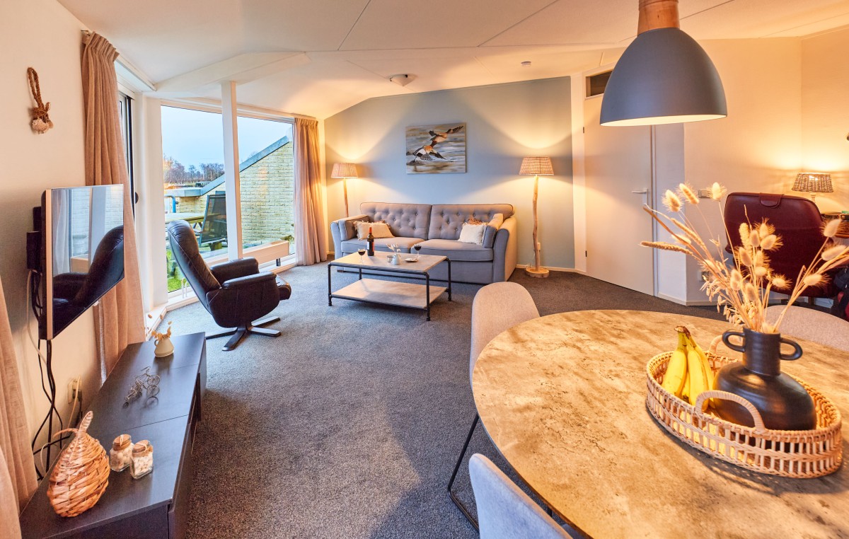 Afbeelding van Uniek appartement met meerzicht en zonsondergang