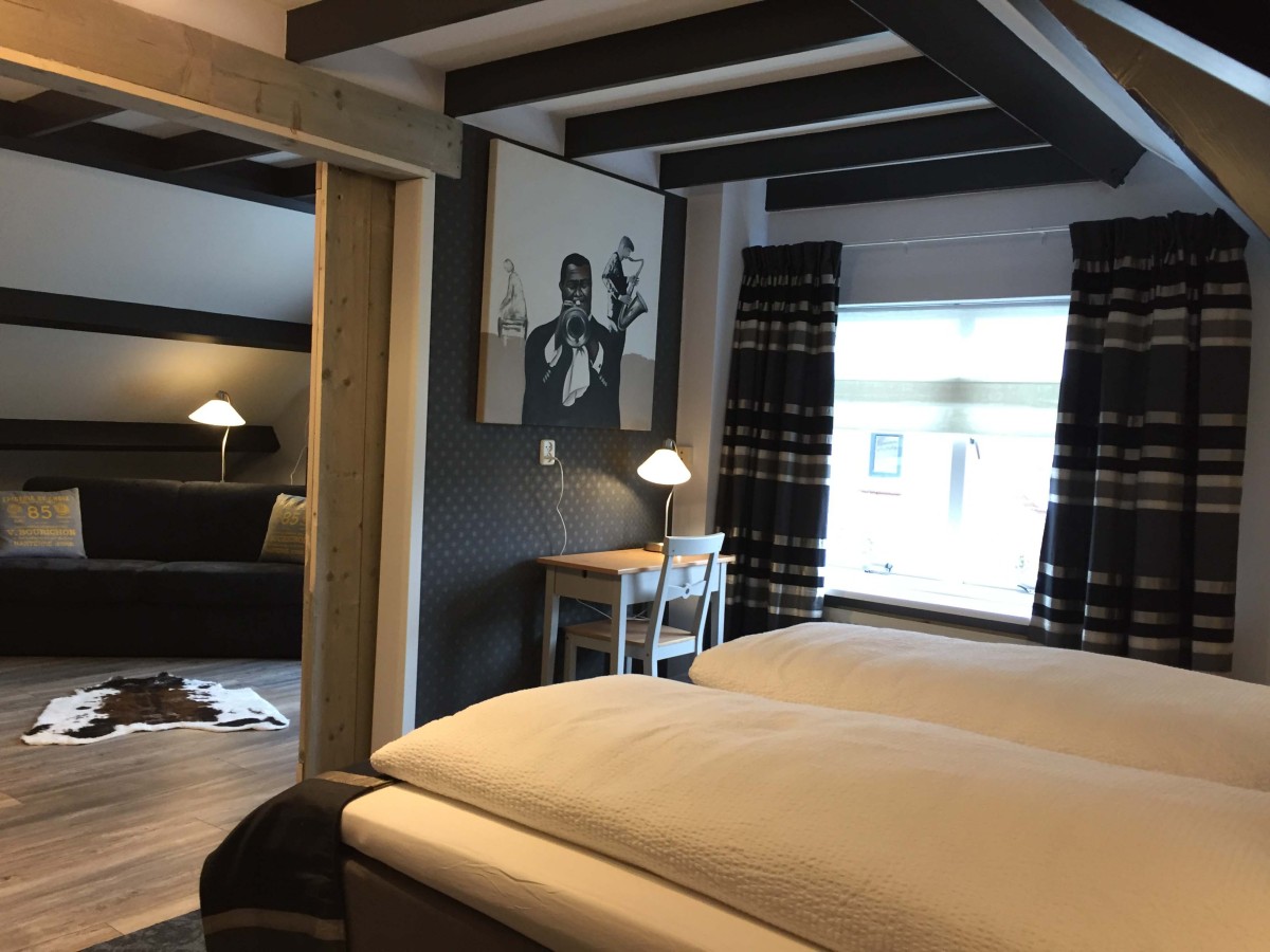 Afbeelding van Vier- tot tweepersoonskamer