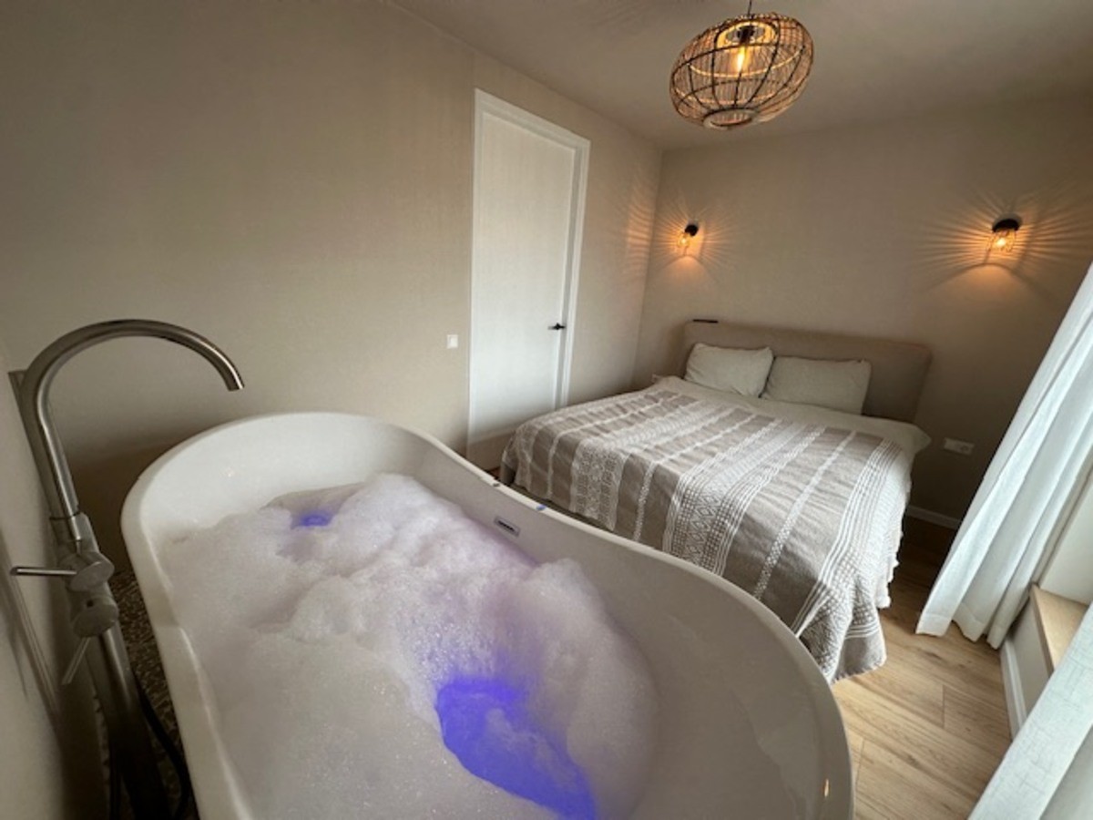 Afbeelding van Luxe Appartement met bubbelbad nabij het station.