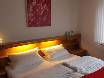 Familienzimmer mit zwei Schlafzimmer
